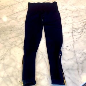 Black Spanx leggings with side gold zipper at ankle . Only worn a few times.